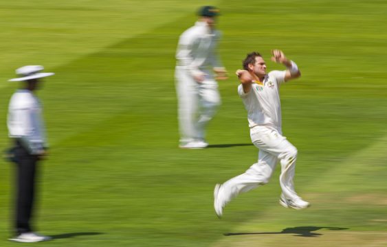 Cricketer bowling